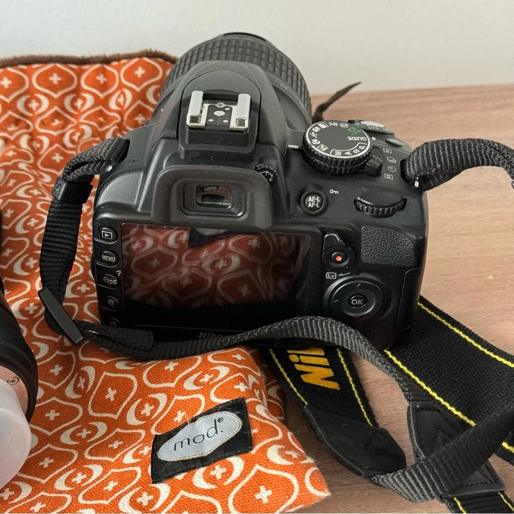 Nikon D3100 with two lenses and carry case. EUC